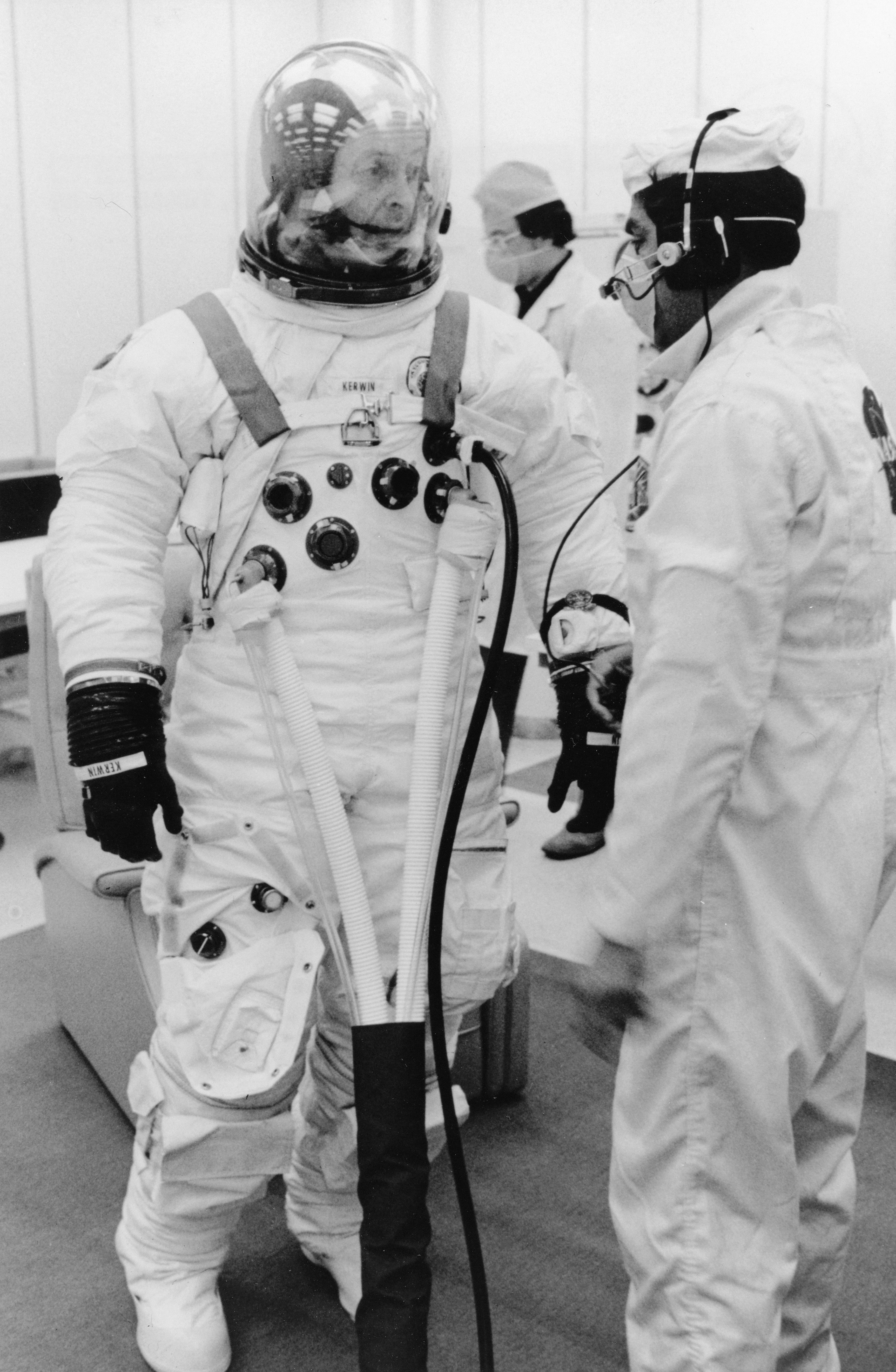 A photograph of Joseph P. Kerwin dressed in an astronaut suit